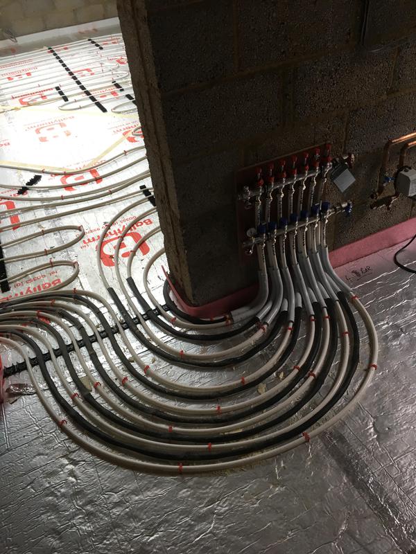 Underfloor heating manifold and pipework installation, Home Counties heating engineer