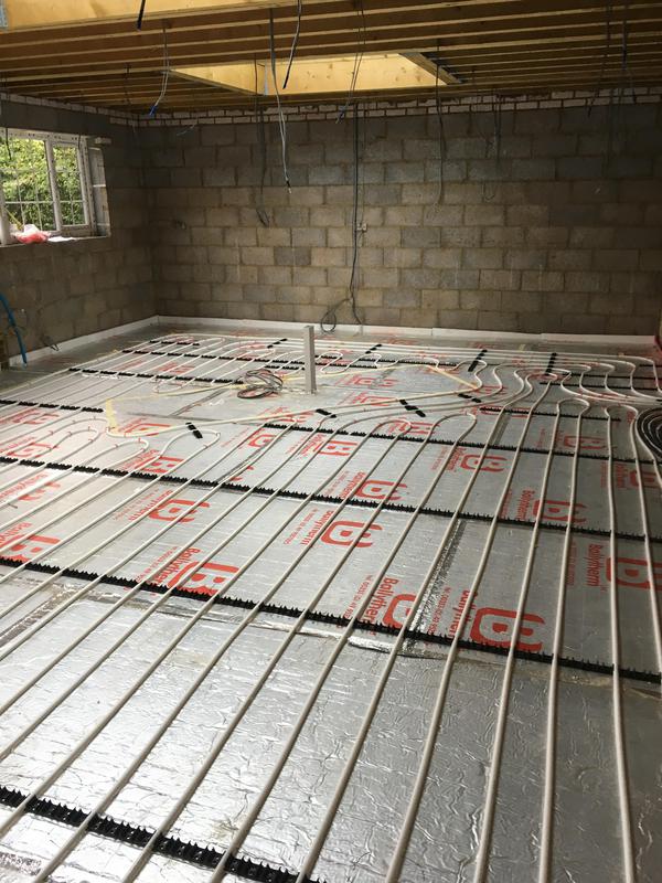 Full wet underfloor heating pipe layout installed across open-plan floor